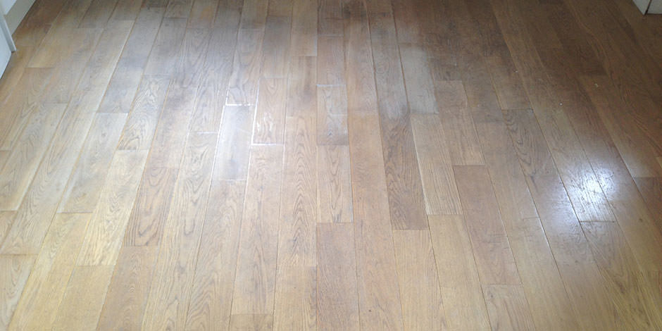 Before-LOUNGE OILED OAK FLOOR IN FINCHLEY
